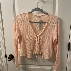 Front tie long sleeve blush blouse